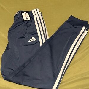 Adidas Kids light Blue Joggers with White Stripes